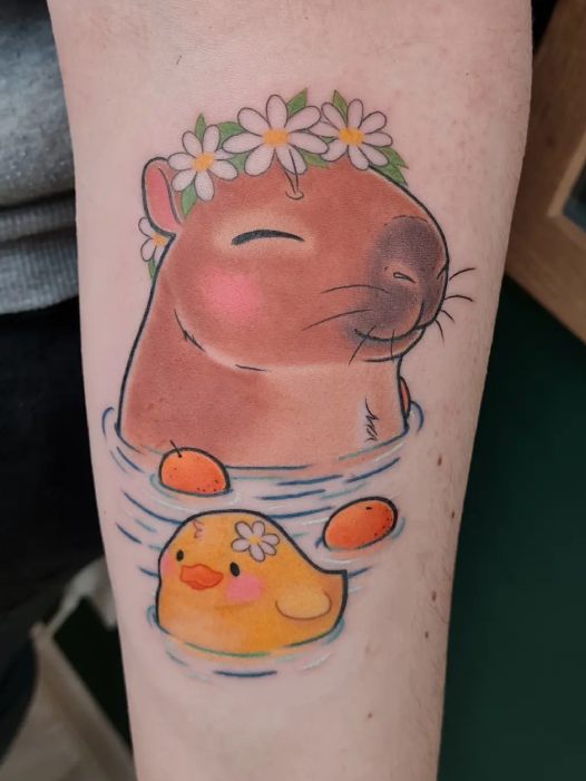 Tatuaż słodkie zwierzątko w wodzie. Studio tatuażu w Dąbrowie Górniczej na śląsku.